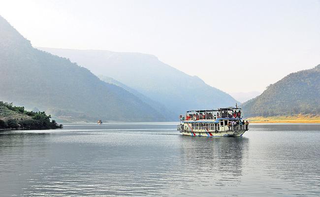 Papikondalu boat ride offering stunning views of hills and the Godavari River.